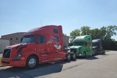 rakmark-red-green-black-trucks